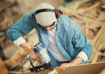 Nail Gun Shooting On Building Site 